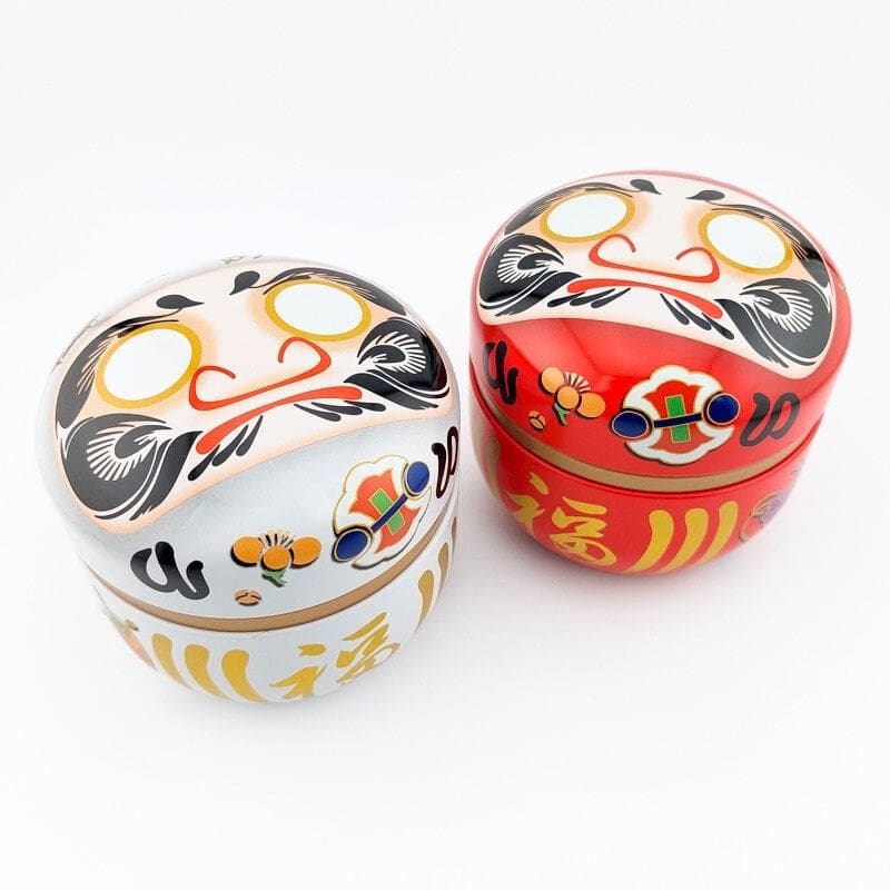 Białe metalowe pudełko na herbatę Daruma