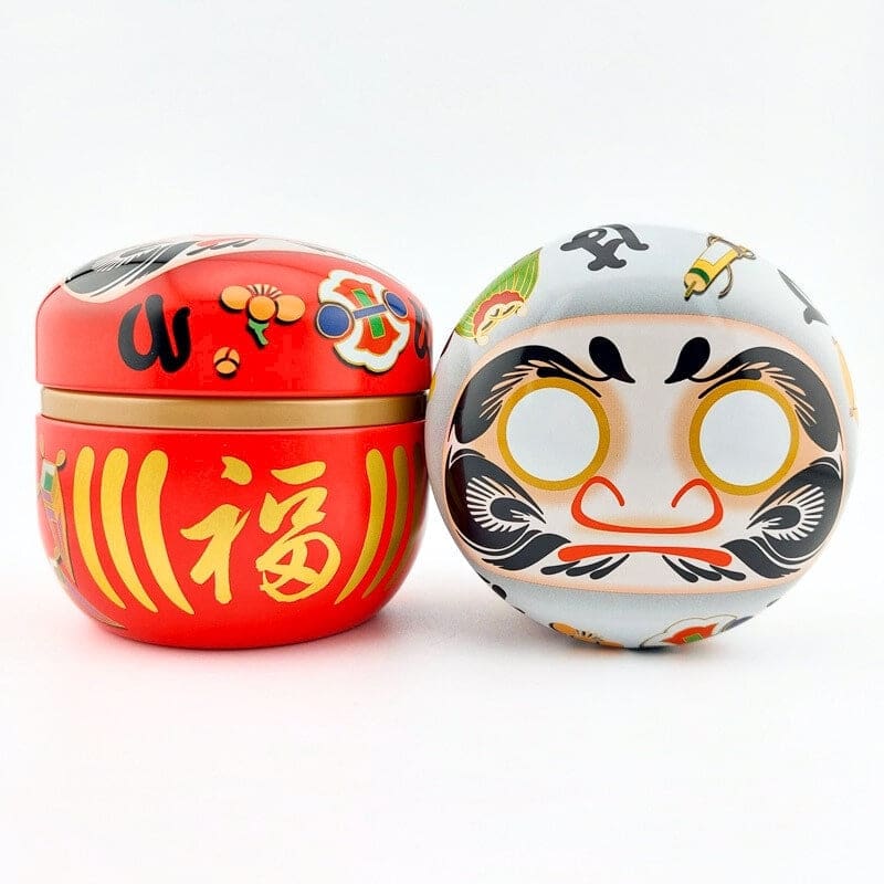Czerwone metalowe pudełko na herbatę Daruma