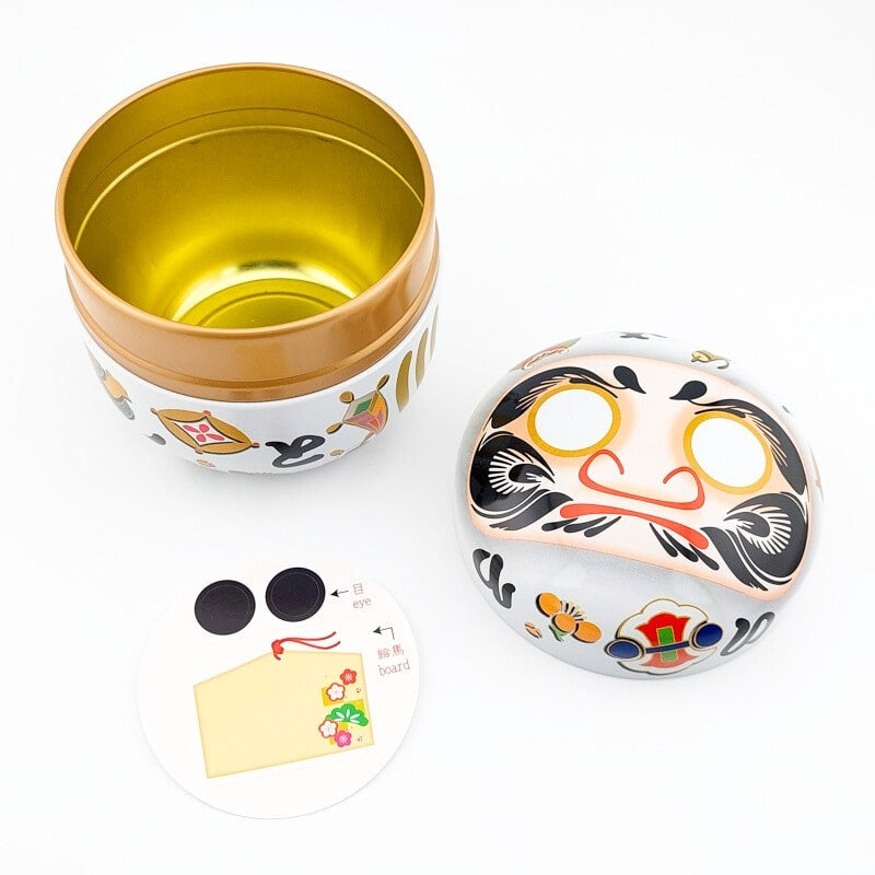 Białe metalowe pudełko na herbatę Daruma