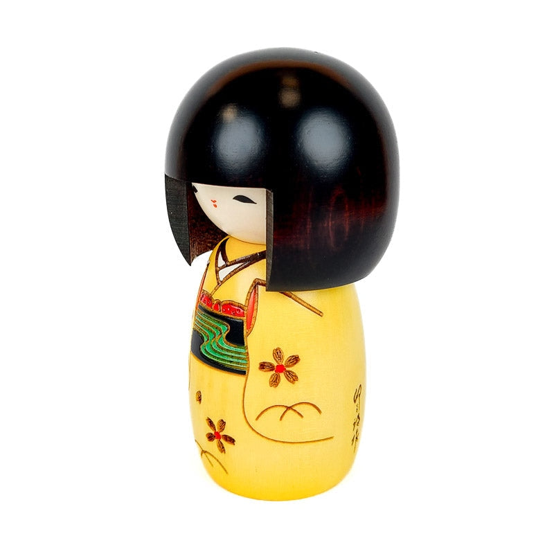 Żółta lalka Kokeshi
