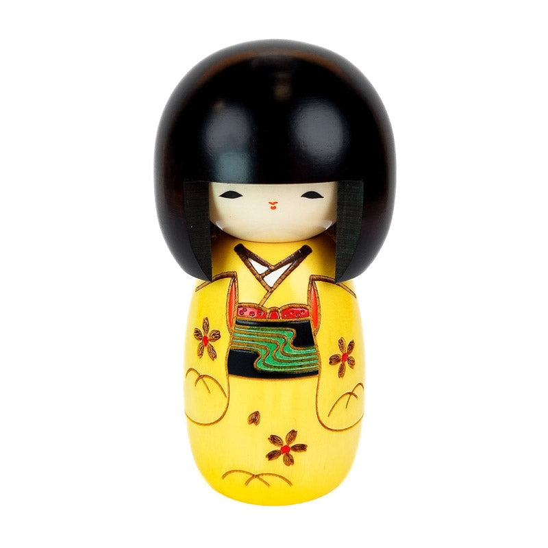 Żółta lalka Kokeshi